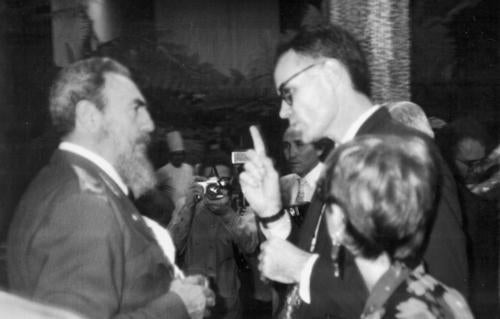 Jim Blight (right) makes his point to Fidel Castro as janet Lang witnesses the moment. The couple dubbed this 1992 photo Cosmic Reversal.