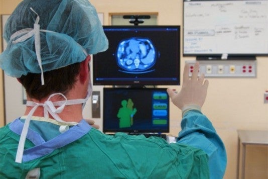Person raising hand to test GestSure technology