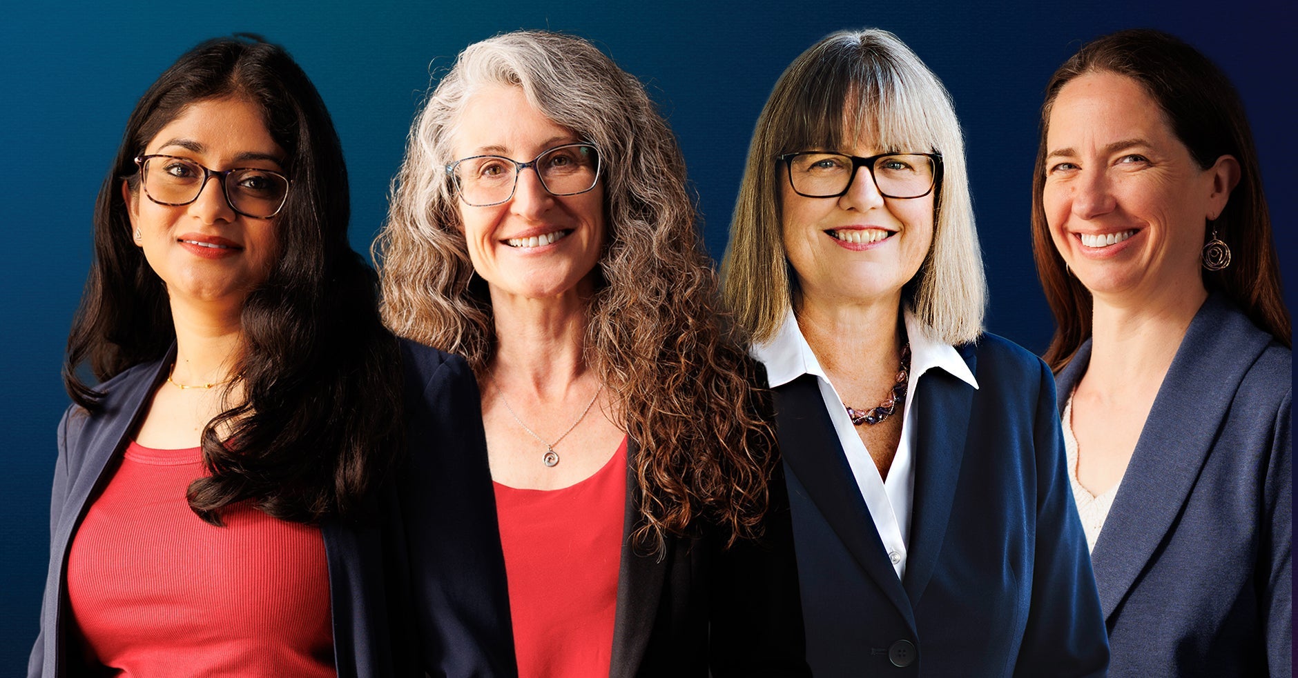 Group of four women in front of a gradient background