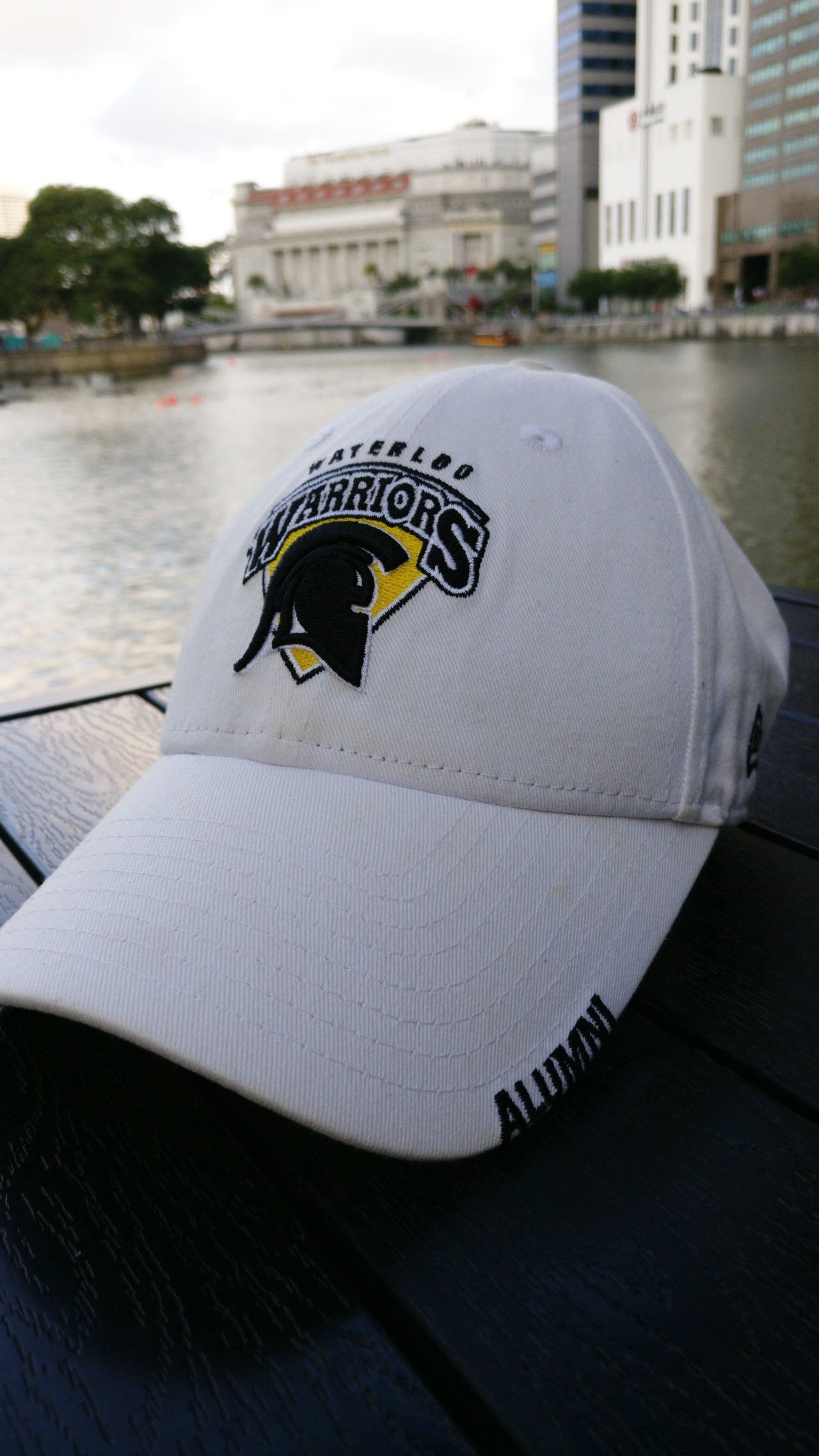 Warriors ball cap on a dock in Singapore