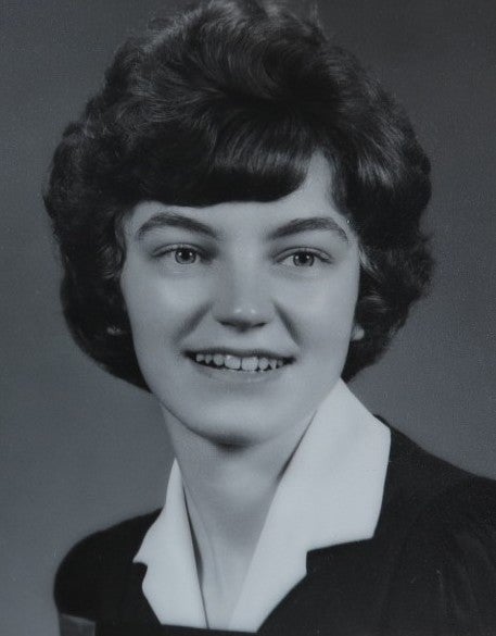 Black and white graduation portrait of young Marian Forster