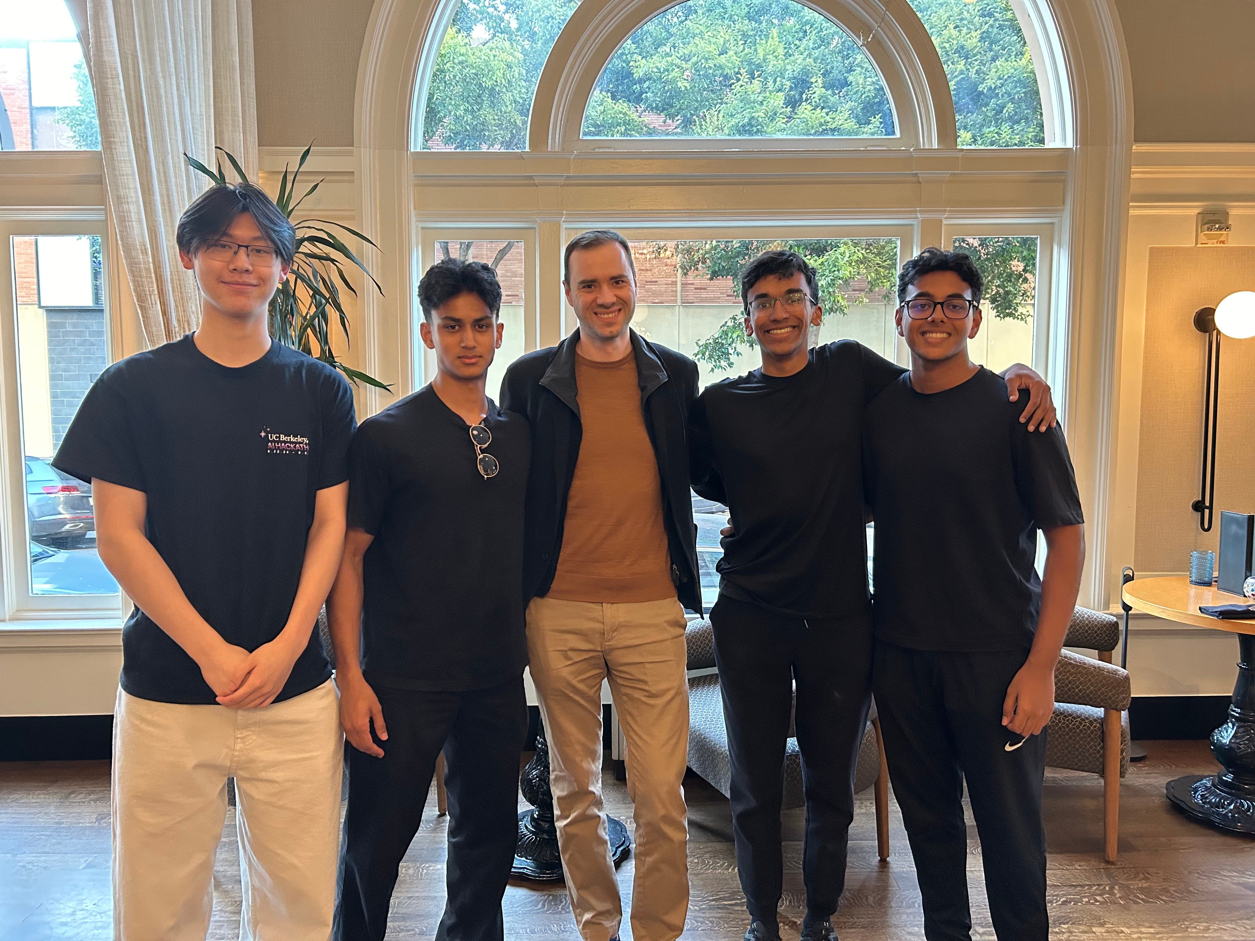 The four team members with Andrej Karpathy