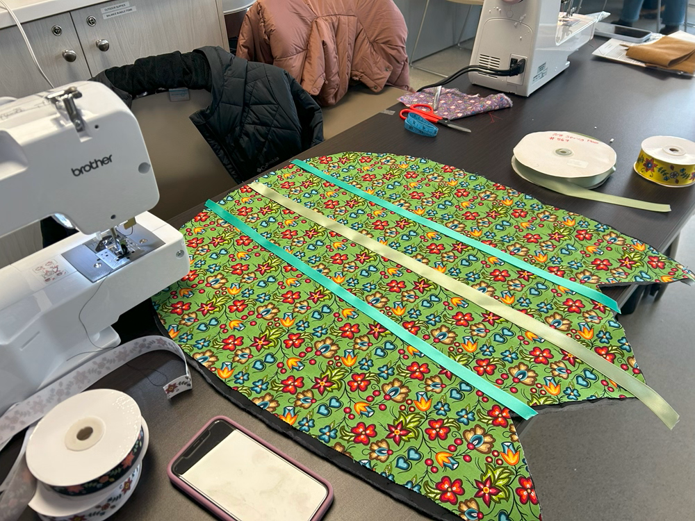Sewing a moss bag.