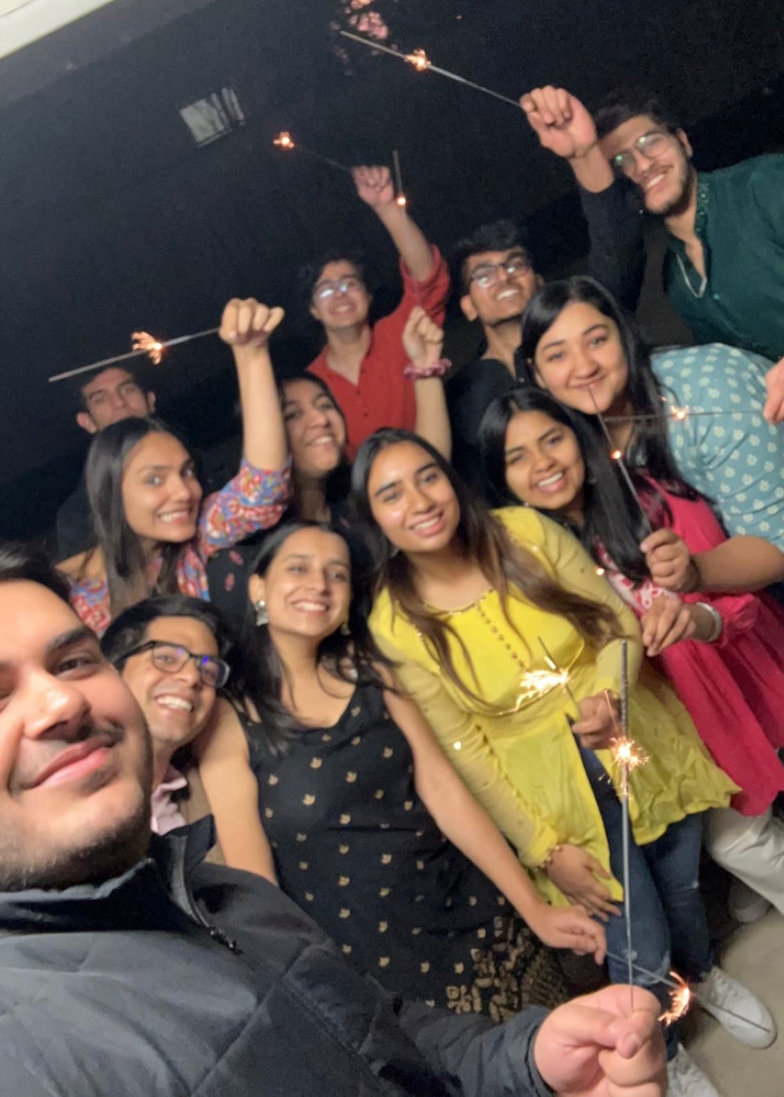 Pallavi and friends holding sparklers
