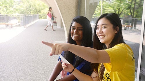 Orientation leader helping student find way