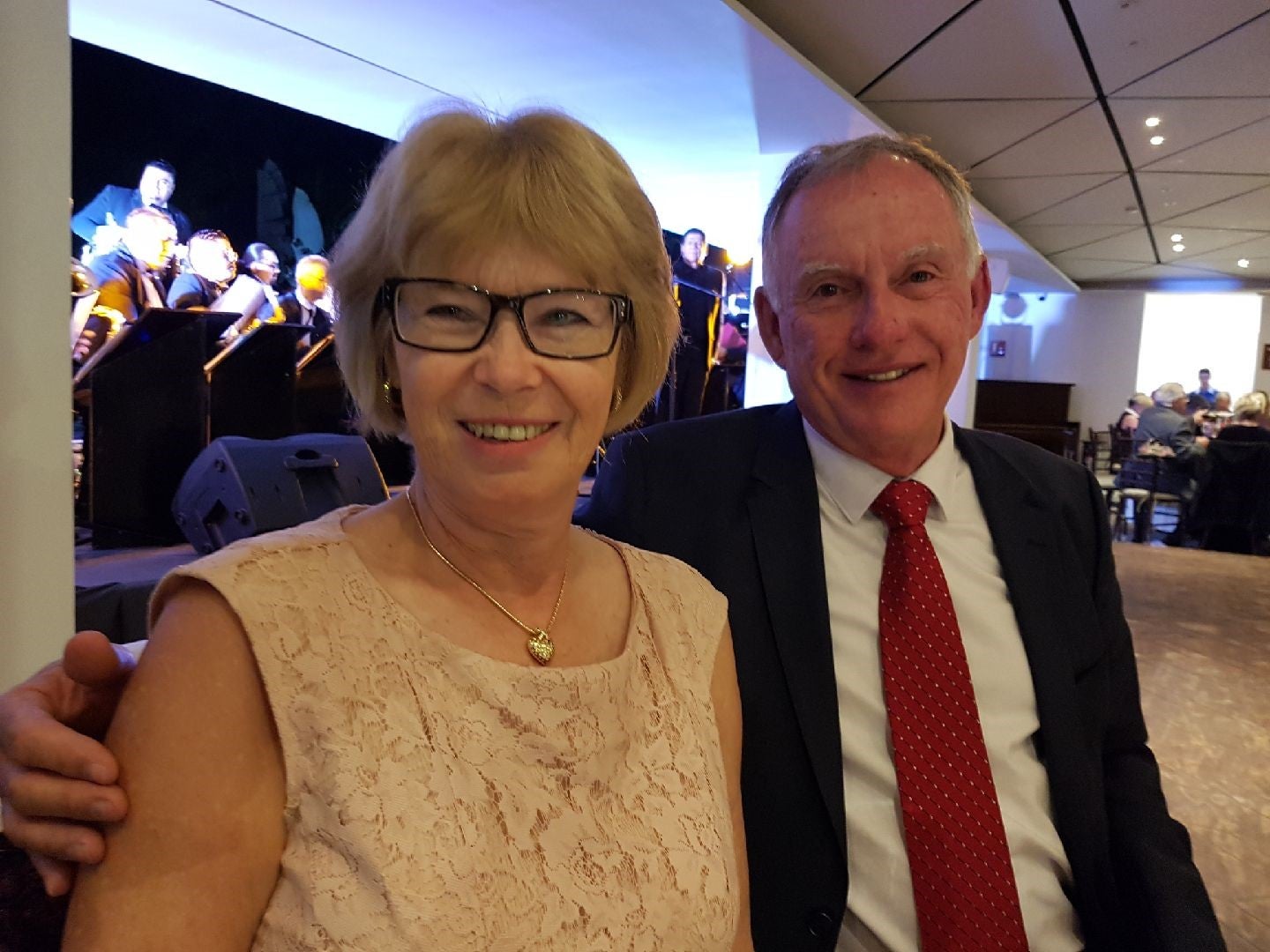 Jane poses with her husband at an event