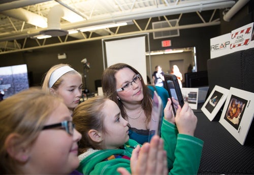 Jennifer Howcroft with members of the Girls Club