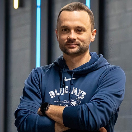 Jeremy Reesor poses with arms crossed 