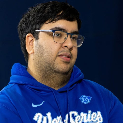 Khalid Talakshi wears World Series Blue Jays hoodie