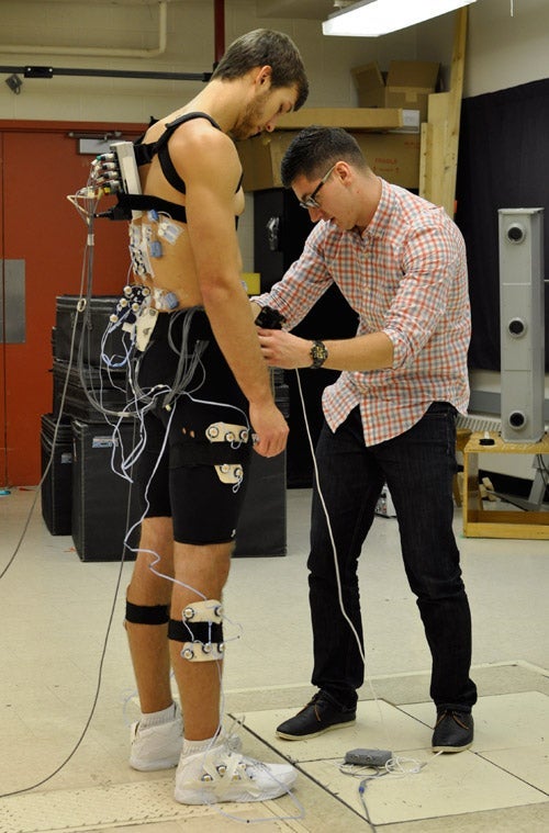 Jordan Cannon hooking up sensors to Jordan Kilganon
