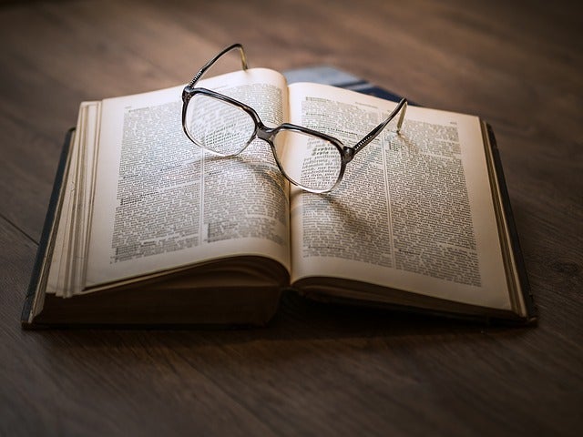 Glasses on books