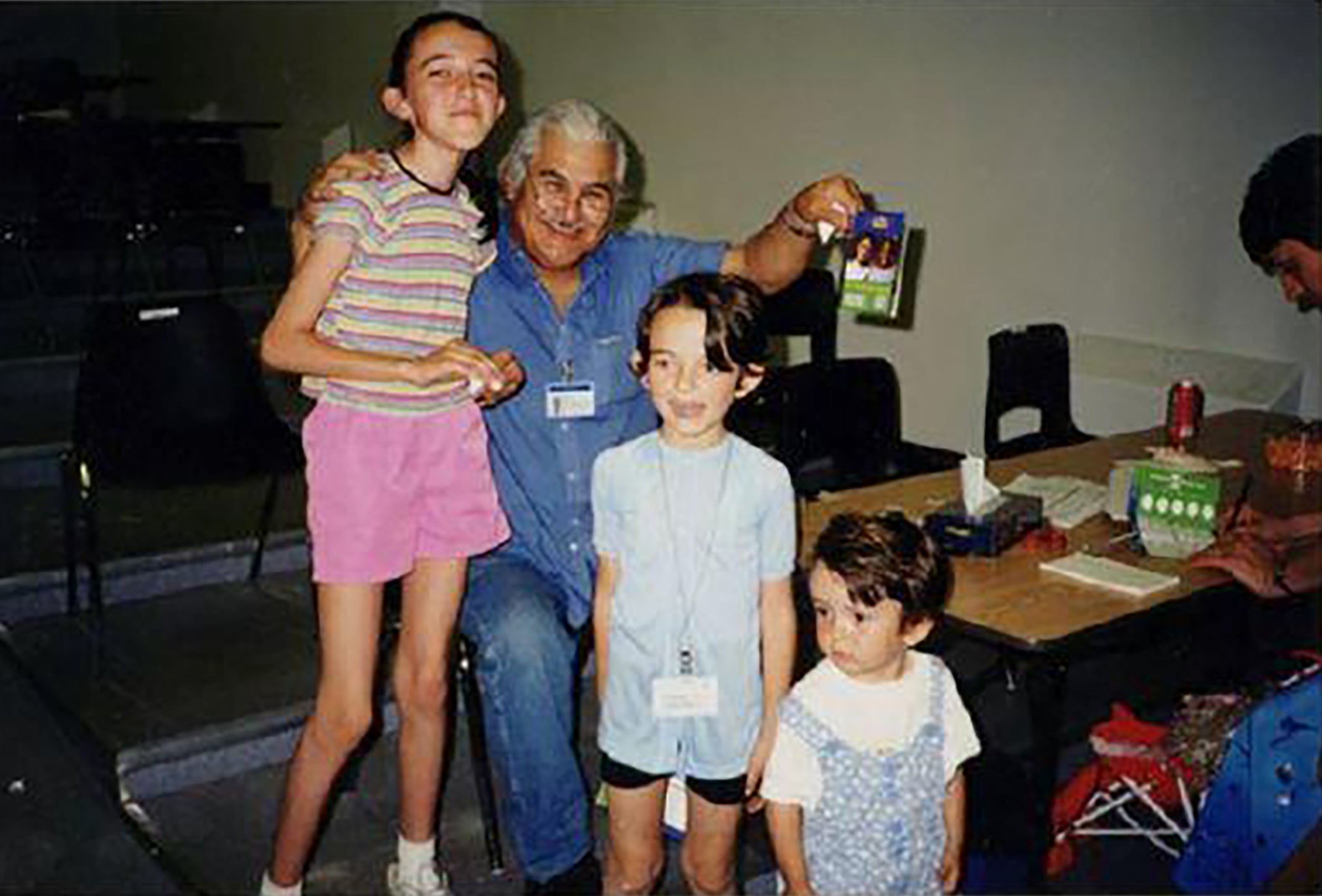 three children with an adult