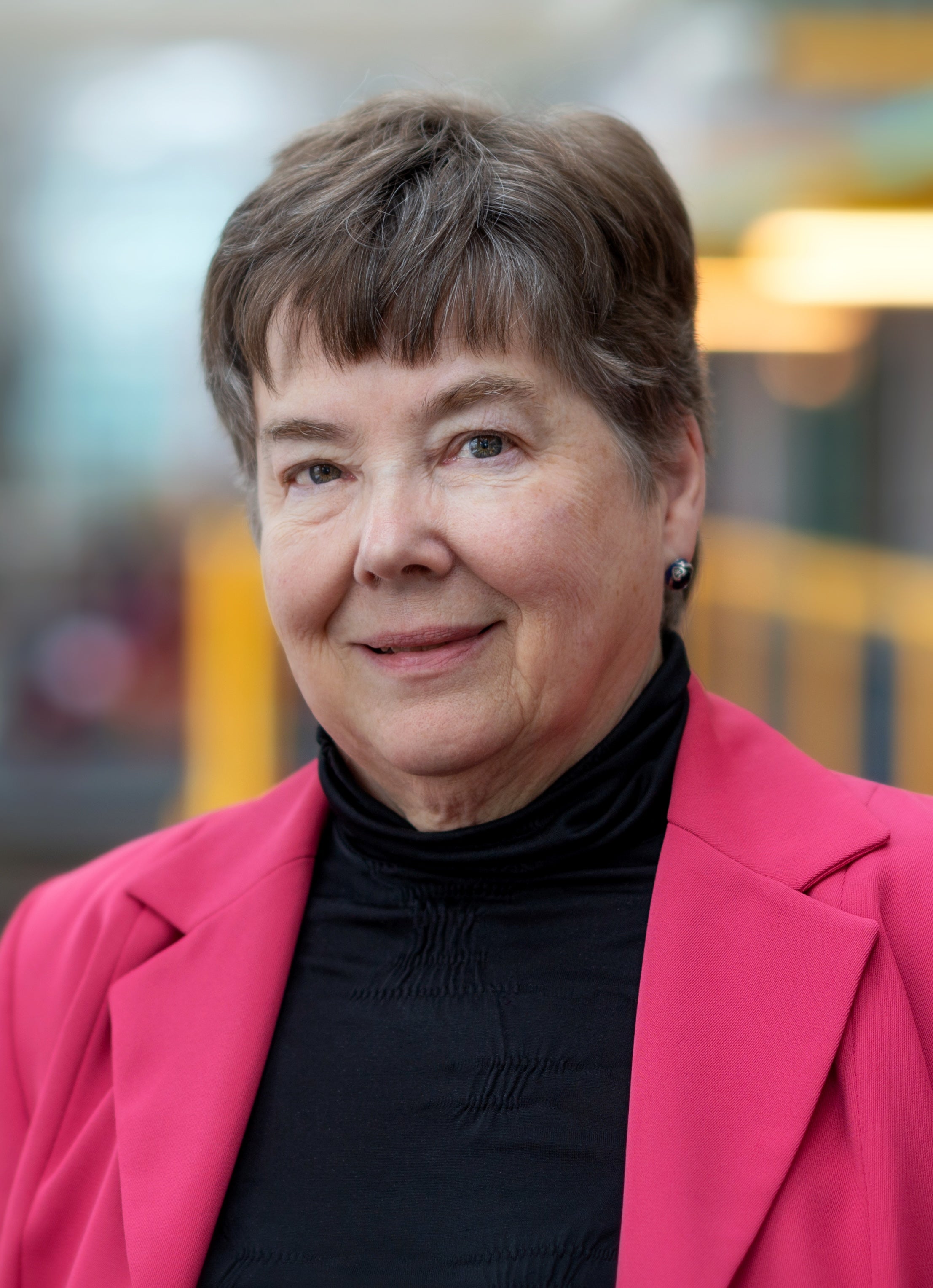 Dr. Mary Thompson wearing a blazer