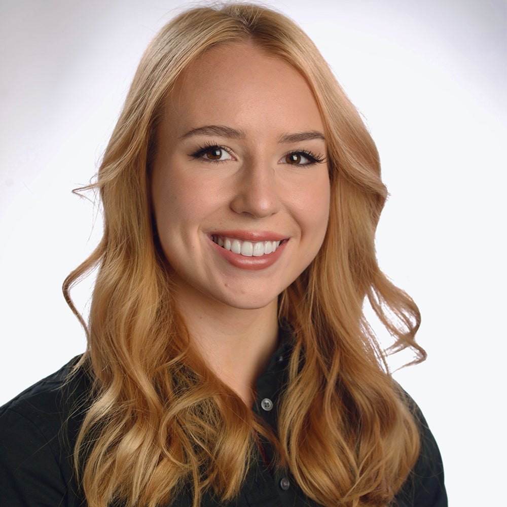 Formal headshot of Meghan LaCoste