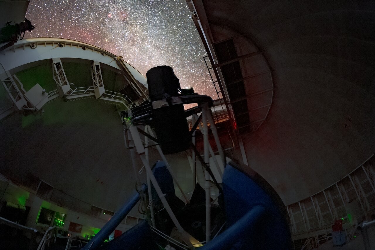 A close-up view of the Dark Energy Spectroscopic Instrument (DESI) taken from underneath the instrument.