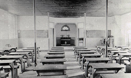 school desks in residential school for First Nations children