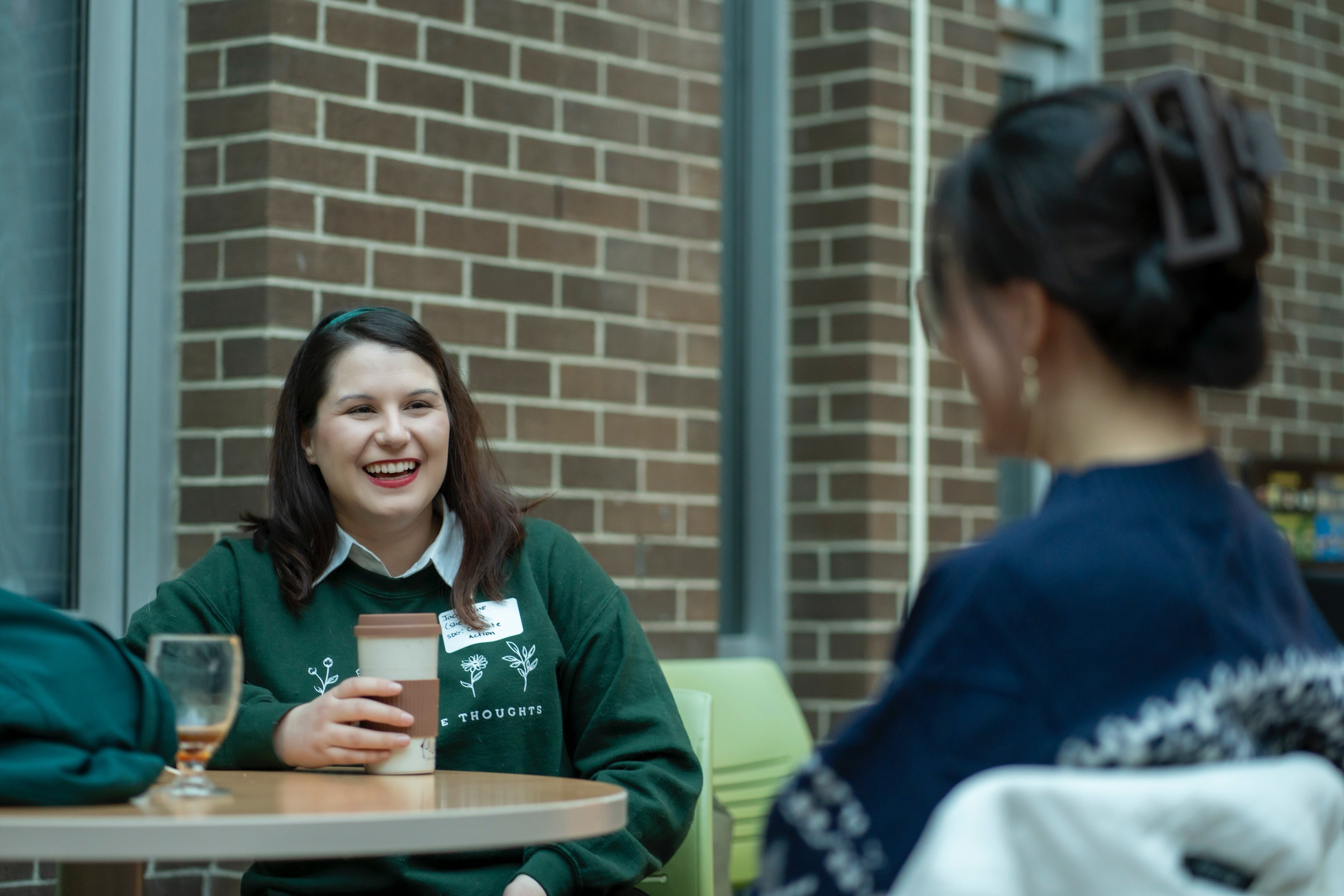 Two graduate students, Jacqueline Ouellette and Yawei (Selina) Han, chat during the SDG Week Canada networking session