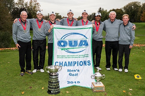 Men's golf team with their trophy