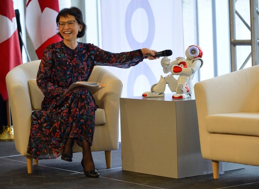 Pearl Sullivan, dean of Waterloo Engineering, interviews humanoid robot Nao 