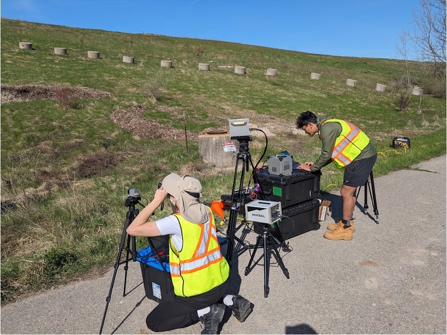 Waterloo researchers at landfill