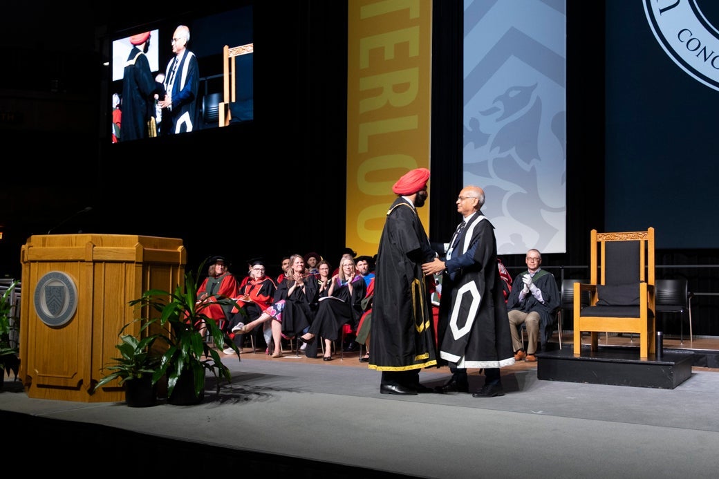 Chancellor Baccher and President Goel on convocation stage