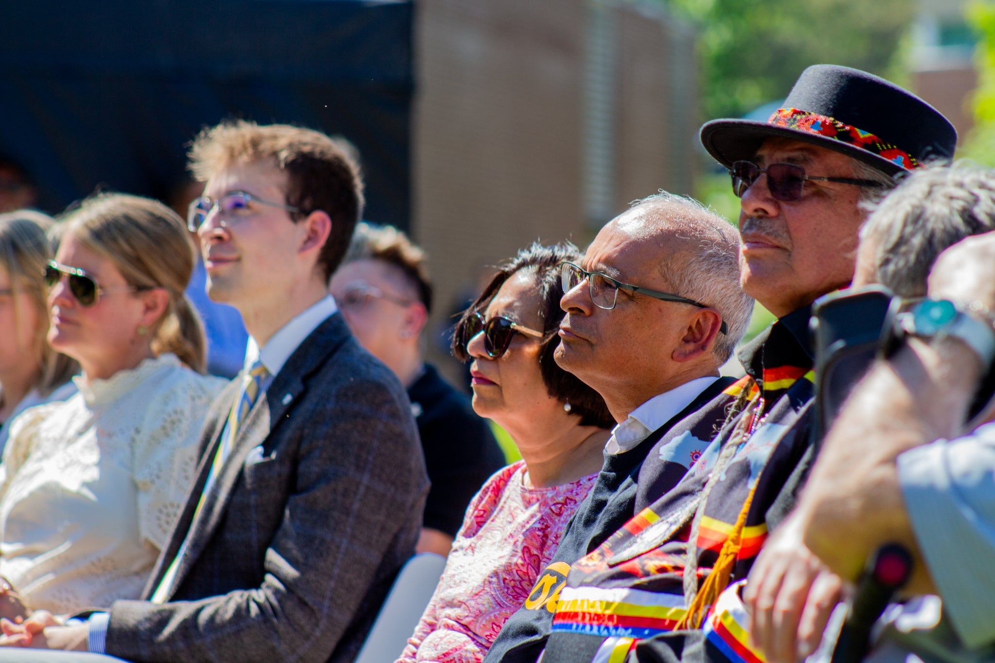 Vivek and his wife Susan in the audience listening to the speaker