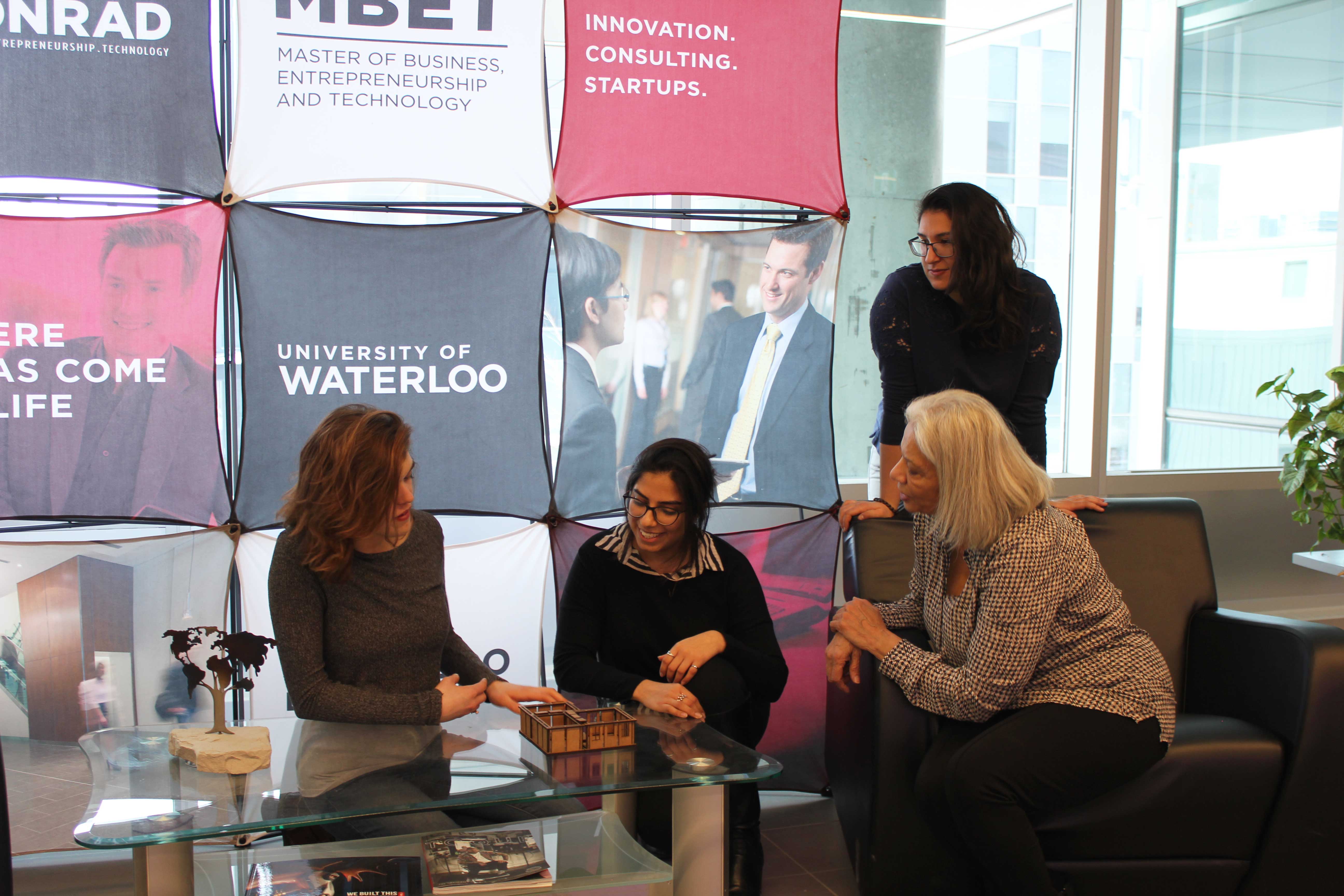 The Pulse Home team demonstrates a model of its Indigenous housing solution during a stakeholder visit on campus in March.