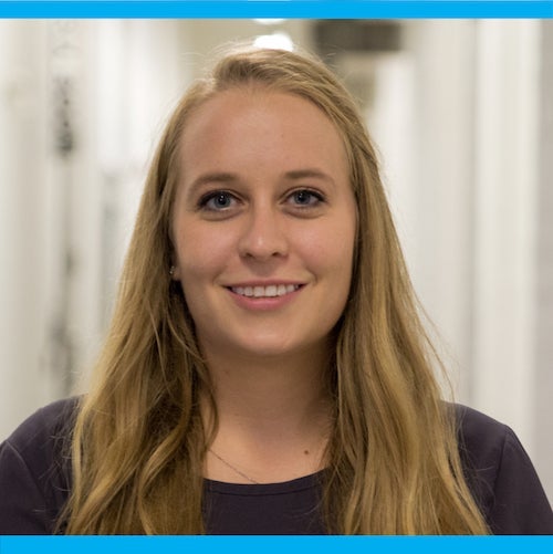 Picture of Rachel smiling directly into the camera.
