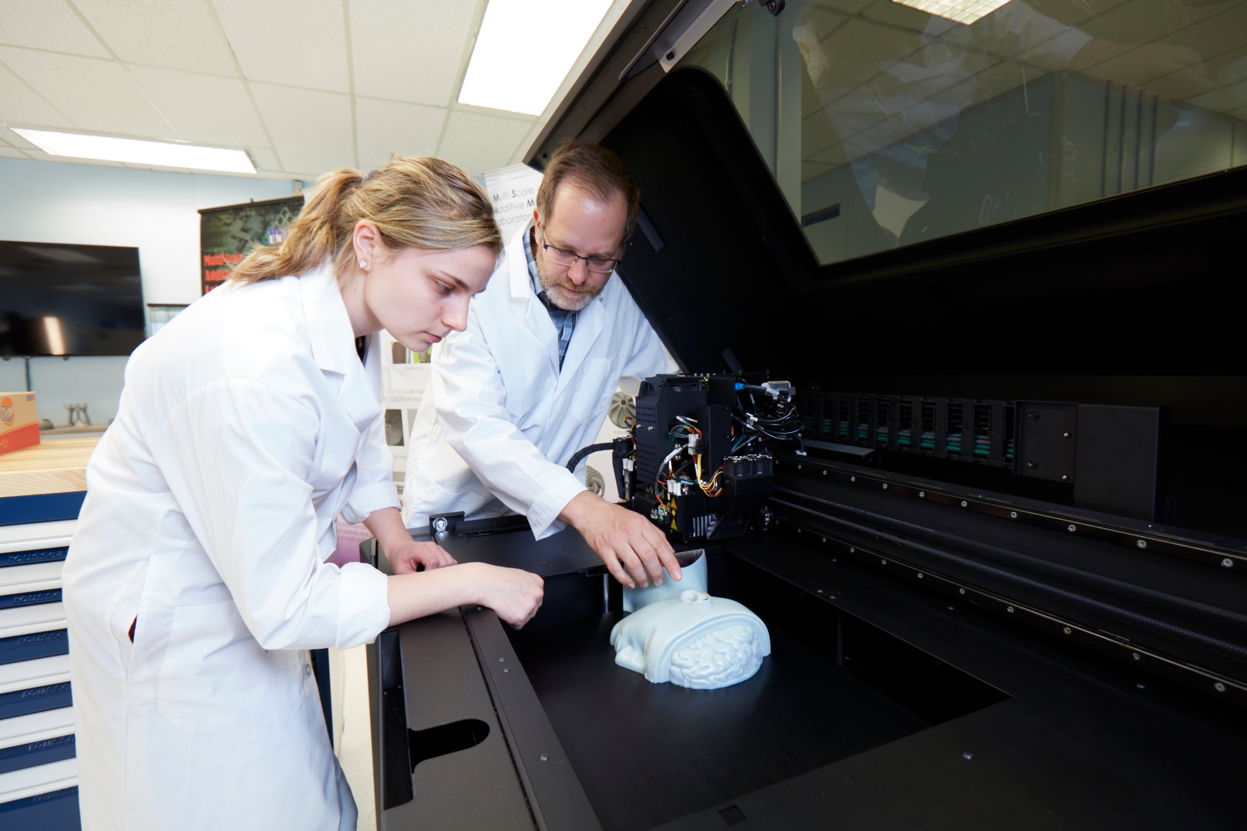 Managing director Mark Barfoot (right) and co-op student Agata Jarkiewicz (left) work in the MSAM Lab.