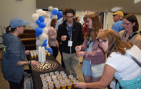 Beer samples being enjoyed by alumni