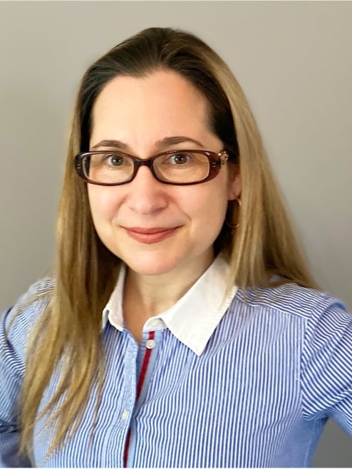 Portrait of Dr. Robin Duncan looking at camera