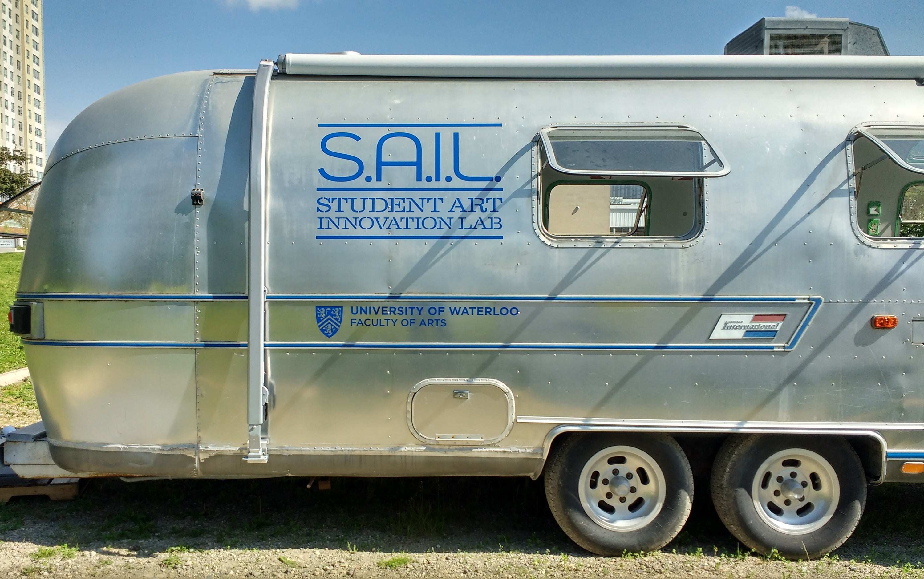 Airstream trailer with SAIL logo printed on its side
