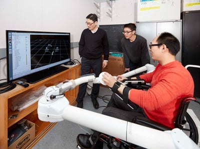 Soo Jeon and graduate students testing out the equipment