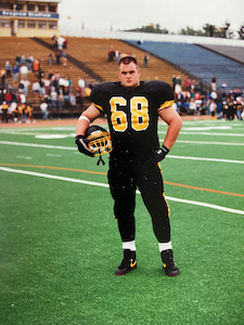 Stephen in an official football photo from the 1990s
