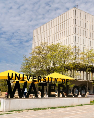 Dana Porter Library tower with University of Waterloo sign below 