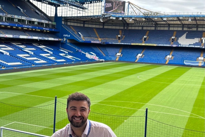 Ethan Rad standing in front of the field at London Stadium