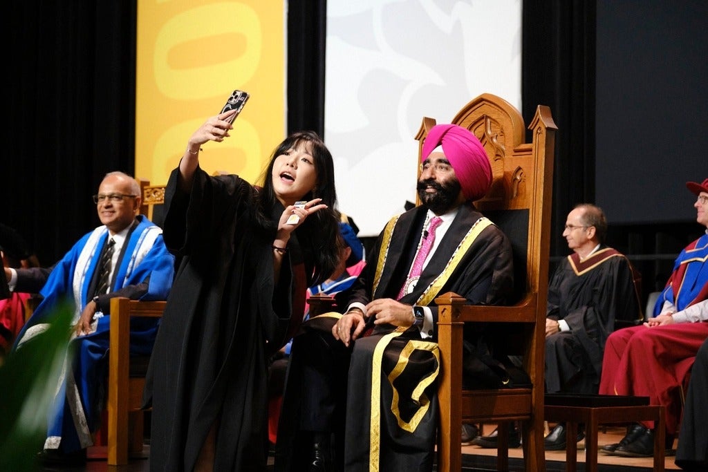 Waterloo chancellor on convocation stage