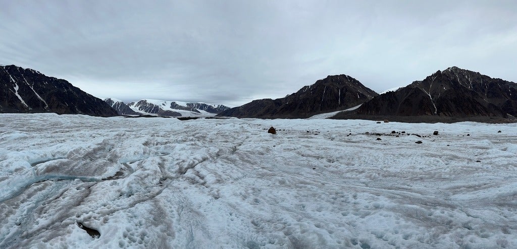 glacier with mountains in the distance