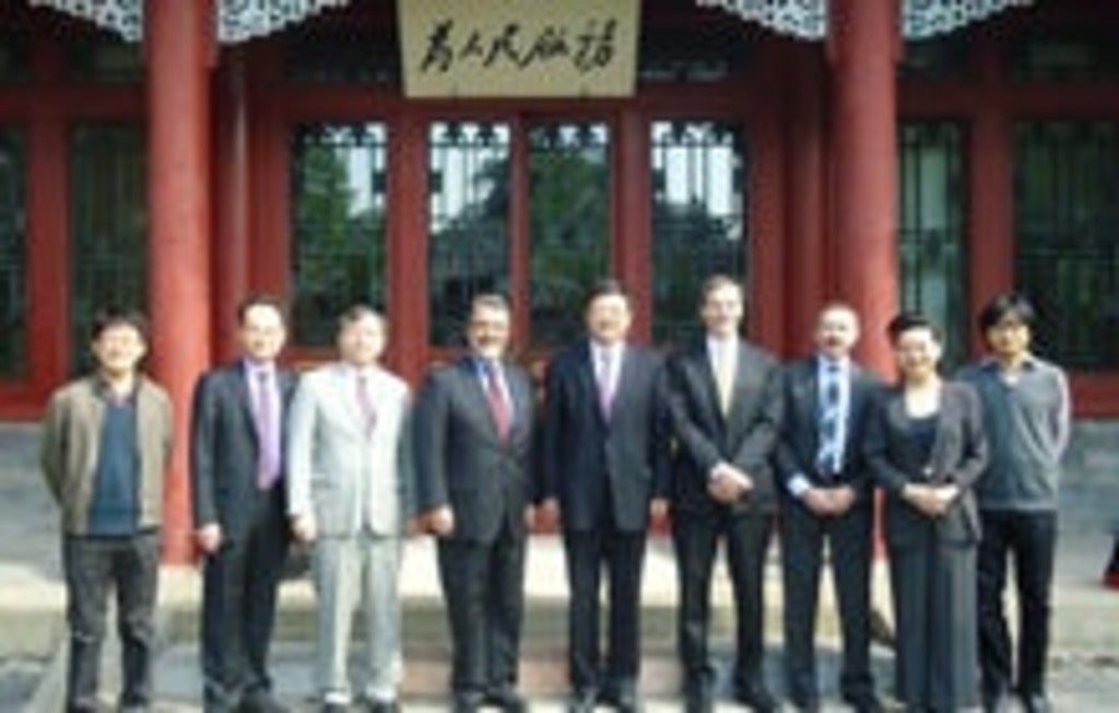 Feridun Hamdullahpur with representatives from the Chinese Ministry of Education