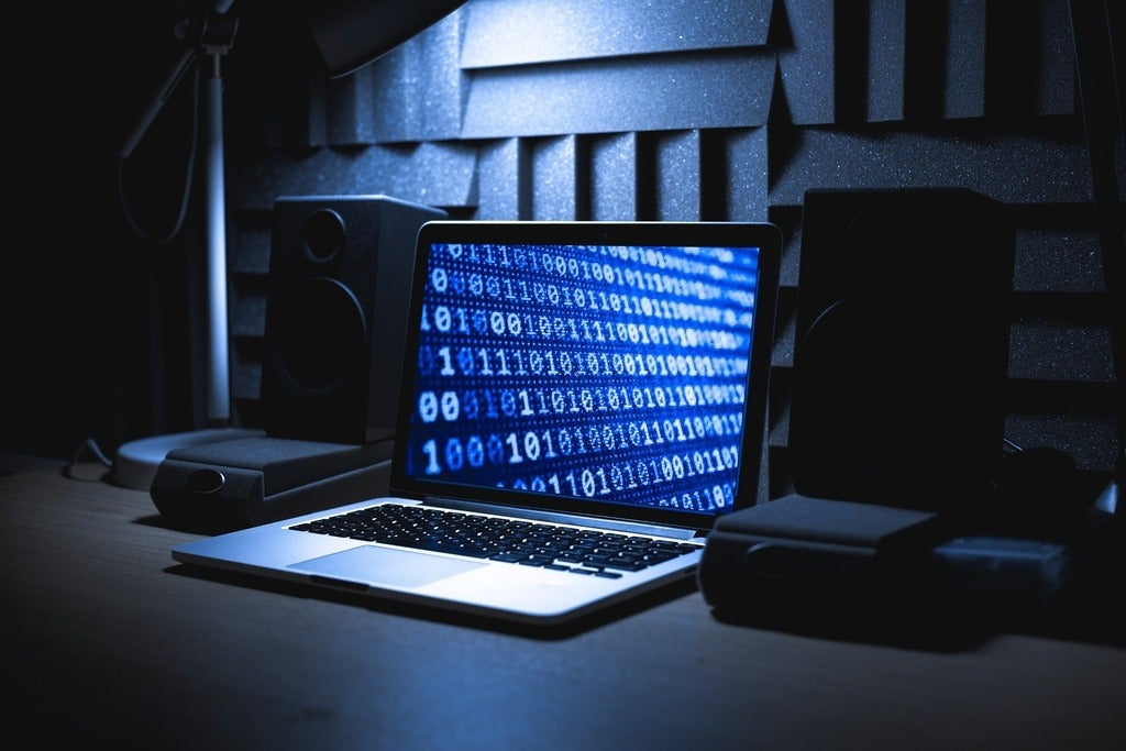 A laptop computer in moody image.