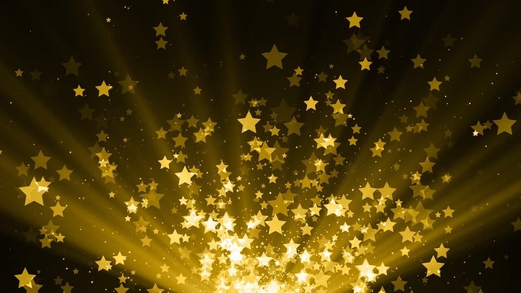 Gold stars against black background