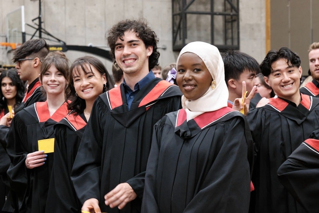 New graduates pose after convocation