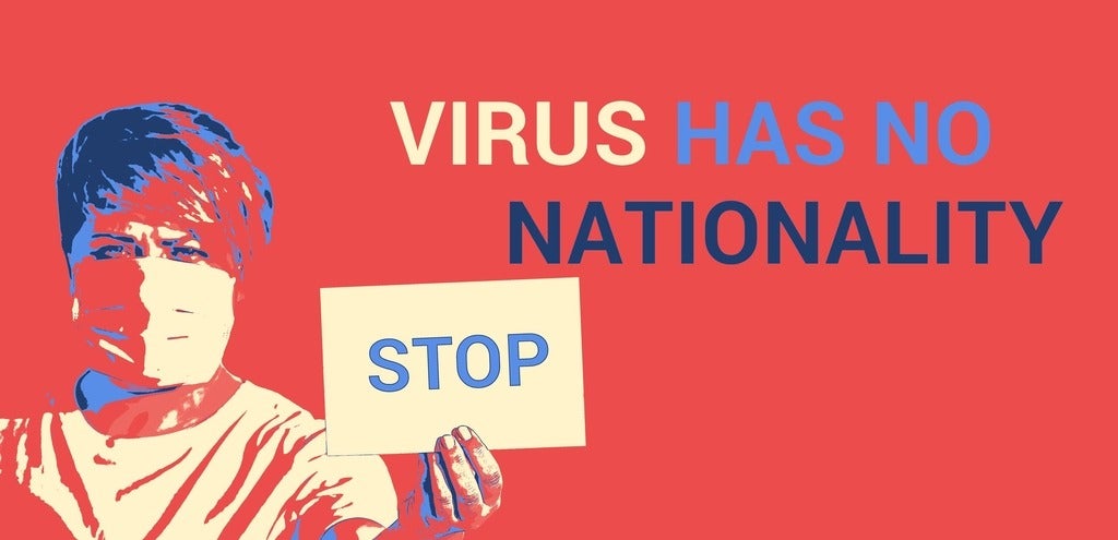 Graphic with the words: Virus has no nationality and a the image of someone holding a sign reading 'stop'