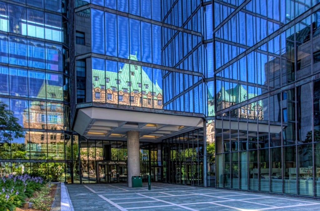 Parliament reflected in Bank of Canada building, Ottawa