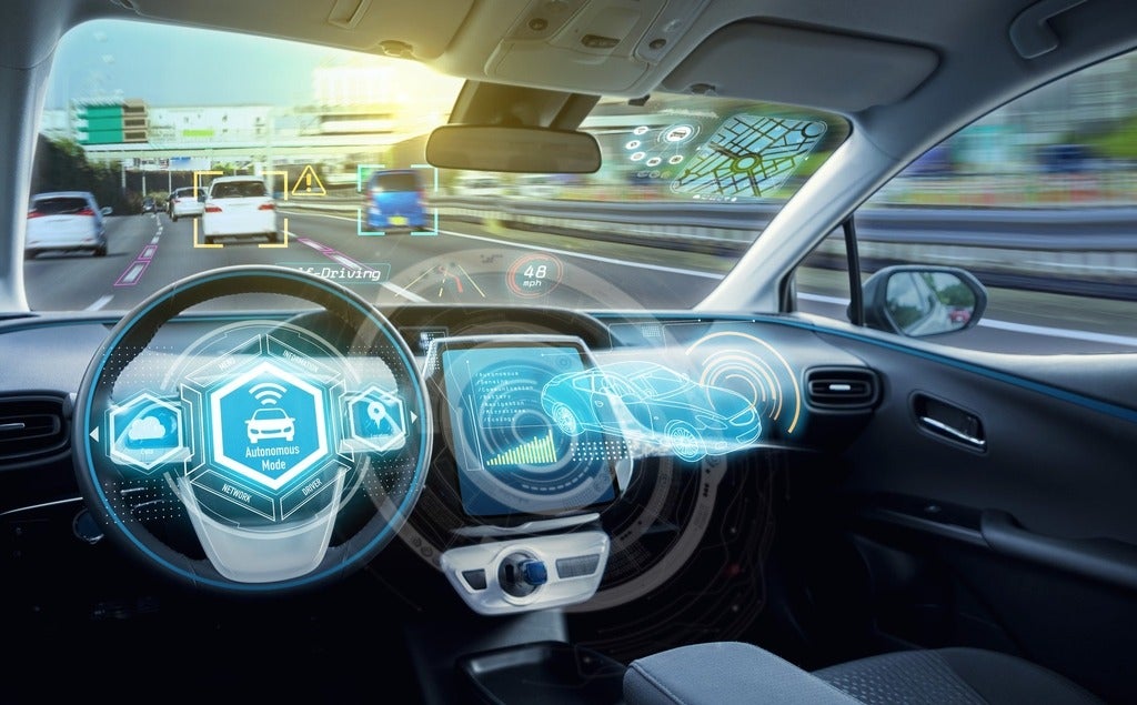 An autonomous car navigating traffic. (Getty Images/metamorworks)