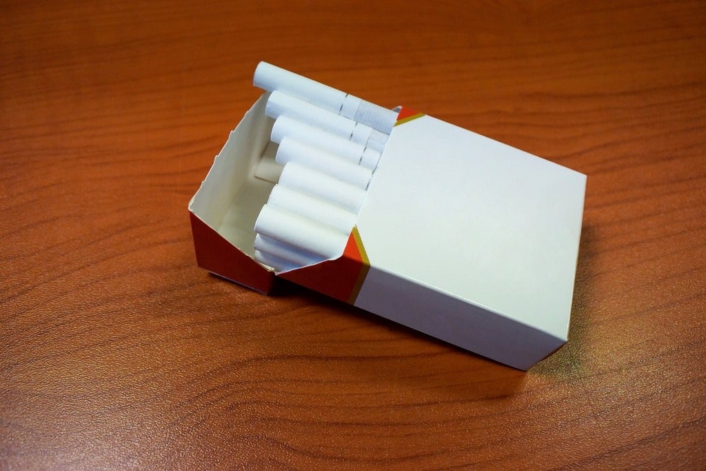 Unbranded cigarette pack on a table