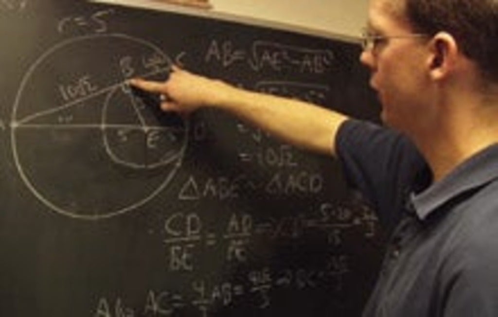 Lecturer Ian VanderBurgh teaching math