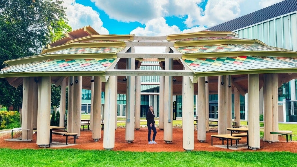 Amy Nahwegahbow admiring the Indigenous Gathering Space on University of Waterloo campus