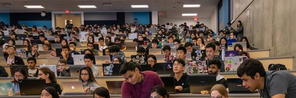 StarterHacks students in lecture hall with laptops