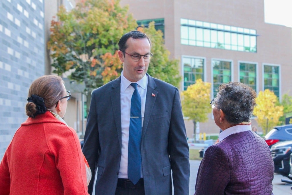 The Honourable Nolan Quinn meeting Dr. Charmaine Dean and Eleanor McMahon